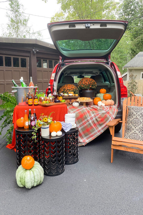 Southern tailgate spread with charcuterie board, cocktails, and game day snacks from In the Curious Kitchen