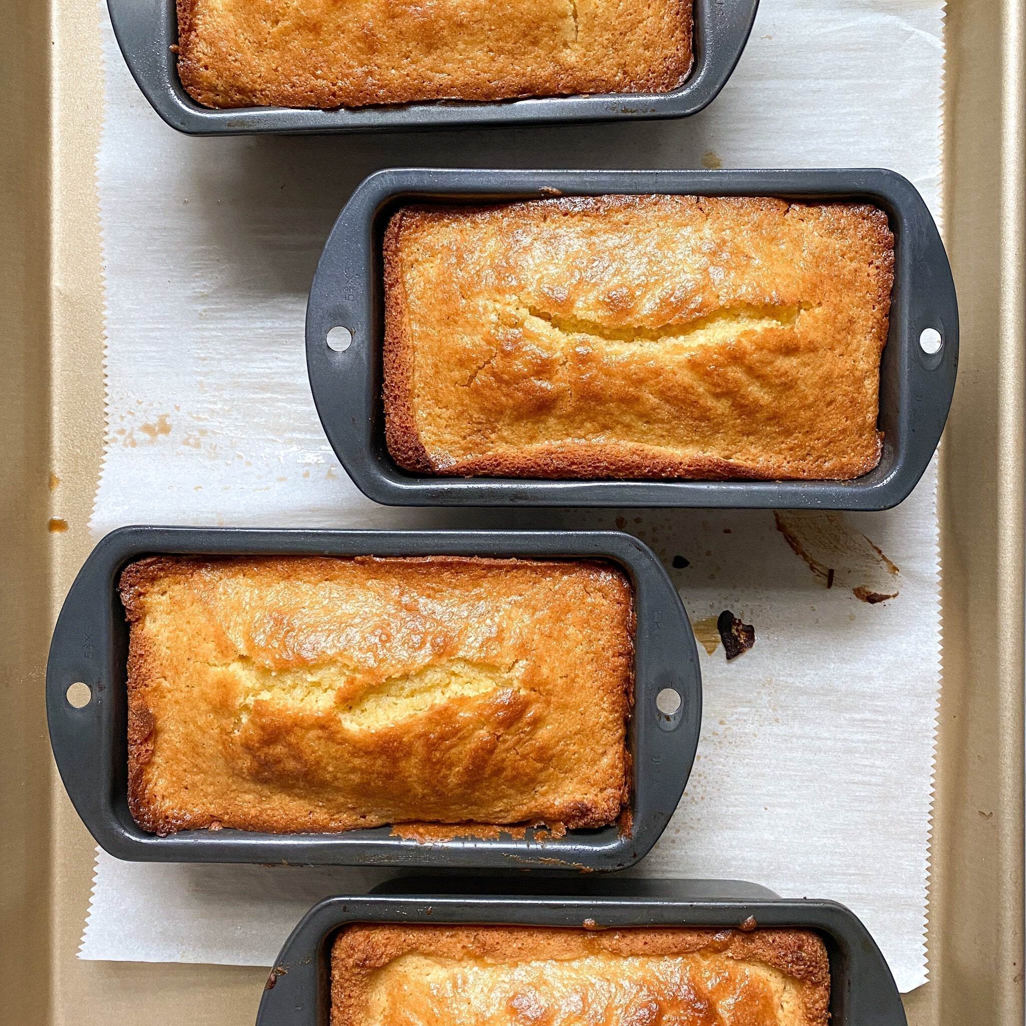 Golden sweet Southern cornbread baked in a mini loaf pan, sliced and served warm with butter