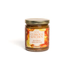 Jar of Bourbon Apple Butter from In the Curious Kitchen on a white background