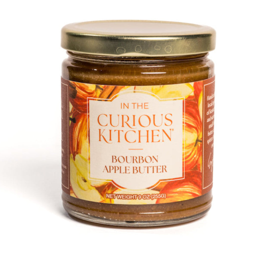 Jar of Bourbon Apple Butter from In the Curious Kitchen on a white background